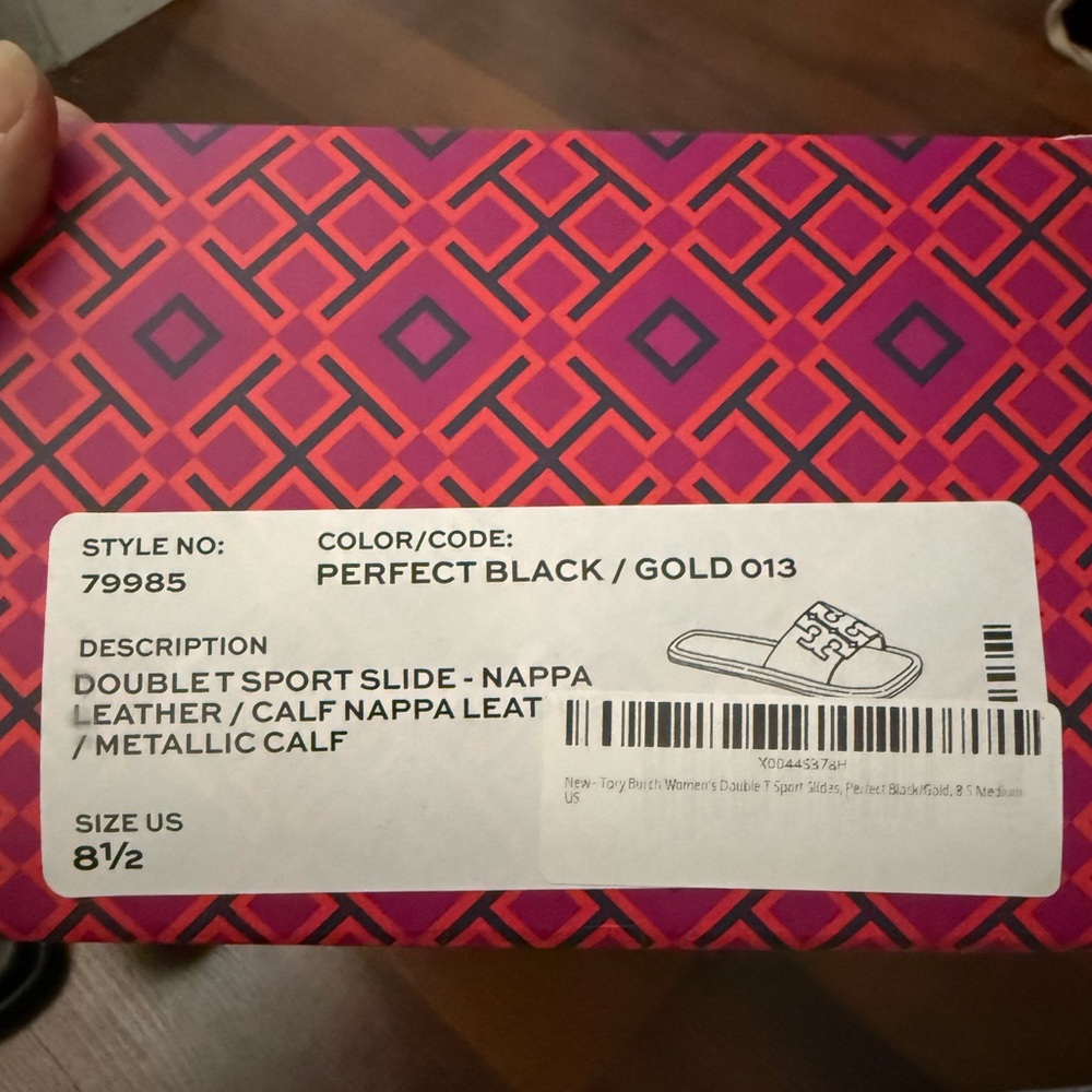 Tory Burch black and Gold sandals